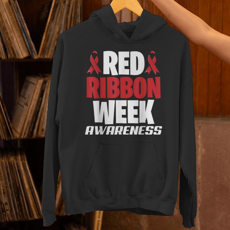 We Wear Red For Red Ribbon Week Awareness Mothers Teachers Unisex Hoodie, gift for family, gift for coworker We Wear Red For Red Ribbon Week Awareness Mothers Teachers Unisex Hoodie, gift for family, gift for coworker