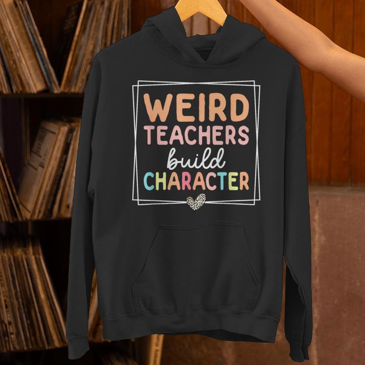 Weird Teachers Build Character Leopard Retro Teacher Unisex Hoodie, gift for family, gift for coworker Weird Teachers Build Character Leopard Retro Teacher Unisex Hoodie, gift for family, gift for coworker