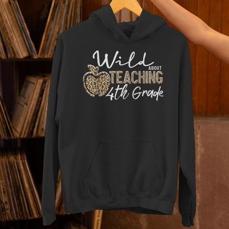 Wild About Teaching School Crew 4th Grade Teacher Squad Unisex Hoodie, 4th Grade Teacher Hoodies, gift for family, gift for coworker