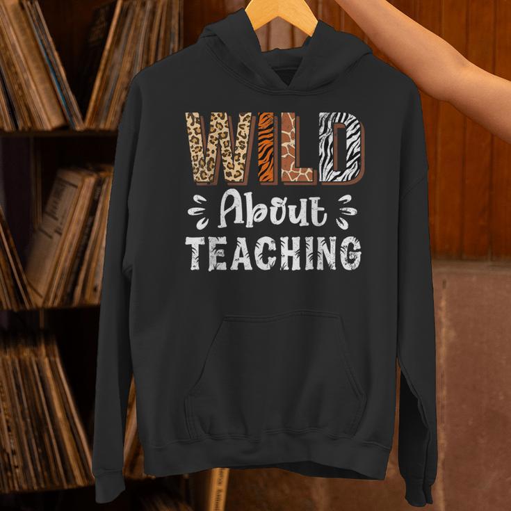 Wild About Teaching Teacher Lover Animals Leopard Zebra Unisex Hoodie, gift for family, gift for coworker Wild About Teaching Teacher Lover Animals Leopard Zebra Unisex Hoodie, gift for family, gift for coworker