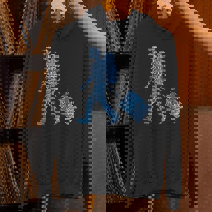 旅への冒険心を抱くシルエットデザイン 世界を巡る旅人たち パーカー