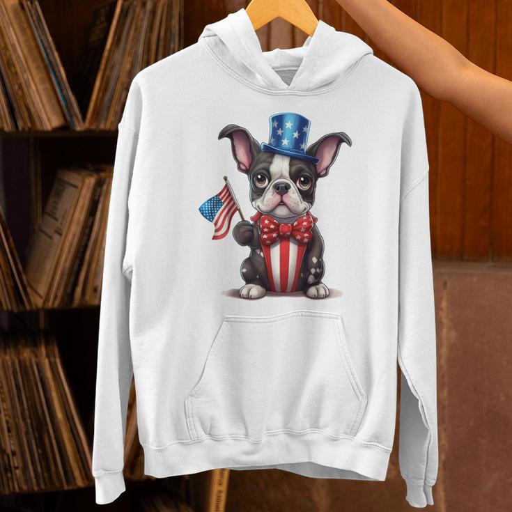 Boston Terrier Puppy Dog Holds His American Flag 4th Of July Unisex Hoodie, American Boston Terrier Hoodies, Boston Terrier 4th Of July Hoodies, gift for family, gift for coworker
