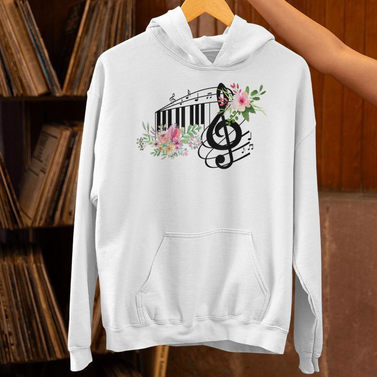 Cut Music Teacher Shirt With a Piano Keys Notes And Flowers Unisex Hoodie, gift for family, gift for coworker