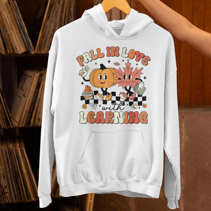 Fall In Love With Learning Teacher Retro Thanksgiving Unisex Hoodie, gift for family, gift for coworker Fall In Love With Learning Teacher Retro Thanksgiving Unisex Hoodie, gift for family, gift for coworker