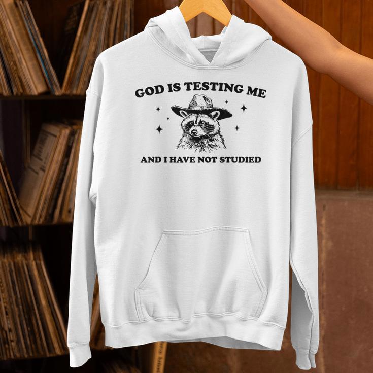 God Is Testing Me And I Have Not Studied Funny Raccon T-Shirt Unisex Hoodie God Is Testing Me And I Have Not Studied Funny Raccon T-Shirt Unisex Hoodie
