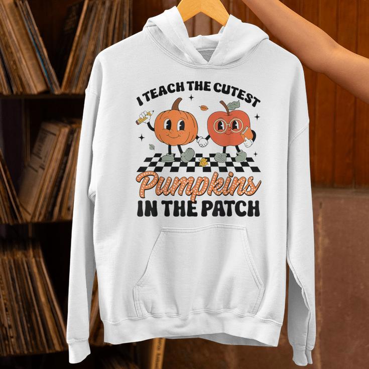 Groovy I Teach The Cutest Pumpkins In The Patch For Teacher Unisex Hoodie, Groovy Teacher Hoodies, gift for family, gift for coworker Groovy I Teach The Cutest Pumpkins In The Patch For Teacher Unisex Hoodie, Groovy Teacher Hoodies, gift for family, gift for coworker