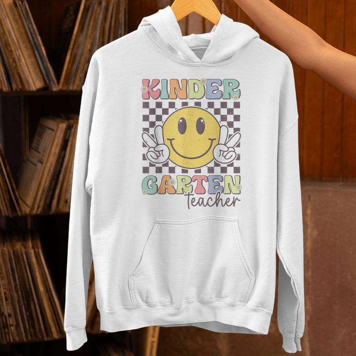 Kindergarten Teacher Team Hippie Smile Face Back To School Unisex Hoodie, gift for family, gift for coworker