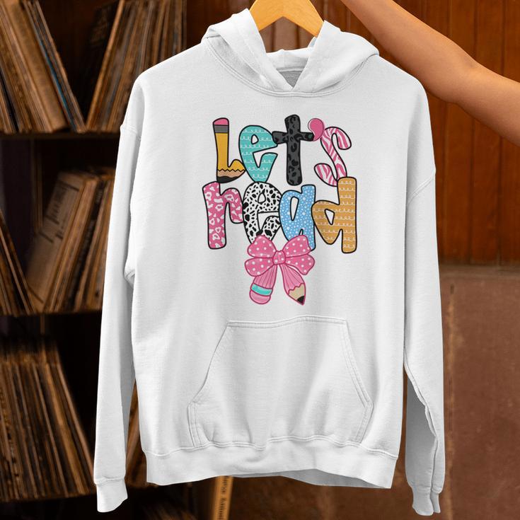Lets Read Reading Teacher Back To School Literacy Pencil Bow Unisex Hoodie, gift for family, gift for coworker Lets Read Reading Teacher Back To School Literacy Pencil Bow Unisex Hoodie, gift for family, gift for coworker