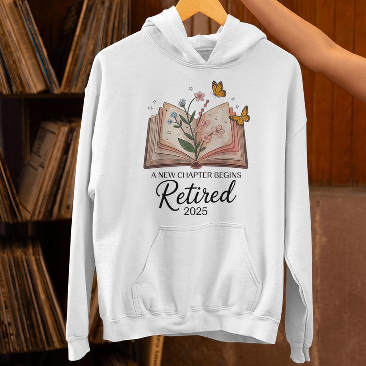 Retired 2025 A New Chapter Begins Retirement Teacher Book Unisex Hoodie, gift for family, gift for coworker