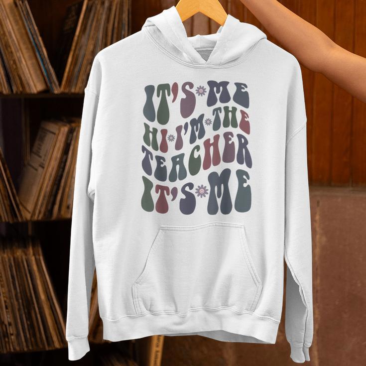 Retro IT'S ME Hi I'm The TEACHER Groovy Testing Squad Pink Unisex Hoodie, Groovy Teacher Hoodies, gift for family, gift for coworker