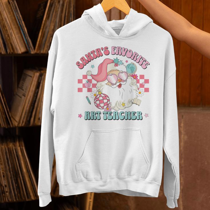 Retro Pink Christmas Santa's Favorite Art Teacher Artist Unisex Hoodie, gift for family, gift for coworker Retro Pink Christmas Santa's Favorite Art Teacher Artist Unisex Hoodie, gift for family, gift for coworker
