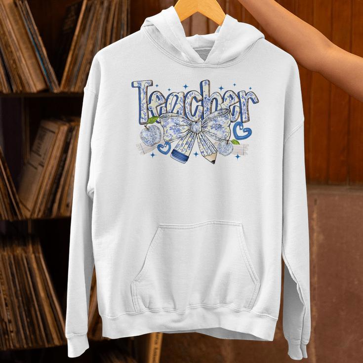 Teacher Blue Chinoiserie Coquette Bow Heart Teacher Life Unisex Hoodie, gift for family, gift for coworker Teacher Blue Chinoiserie Coquette Bow Heart Teacher Life Unisex Hoodie, gift for family, gift for coworker