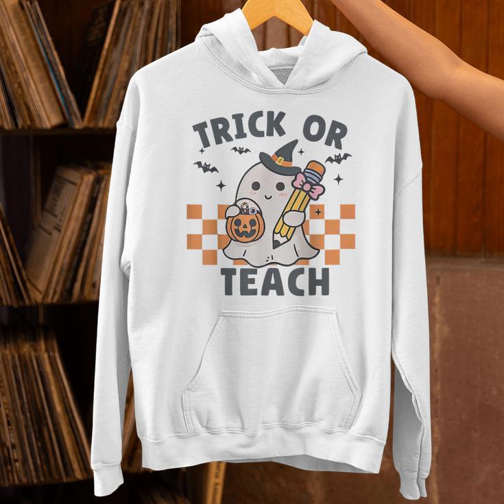 Trick Or Teach Teacher Unisex Hoodie, gift for family, gift for coworker Trick Or Teach Teacher Unisex Hoodie, gift for family, gift for coworker