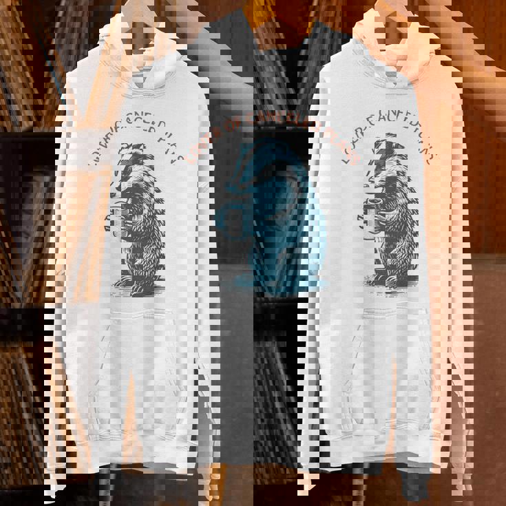 キャンセルされた計画の恋人 コーヒーを飲むアナグマ 長袖tシャツ パーカー