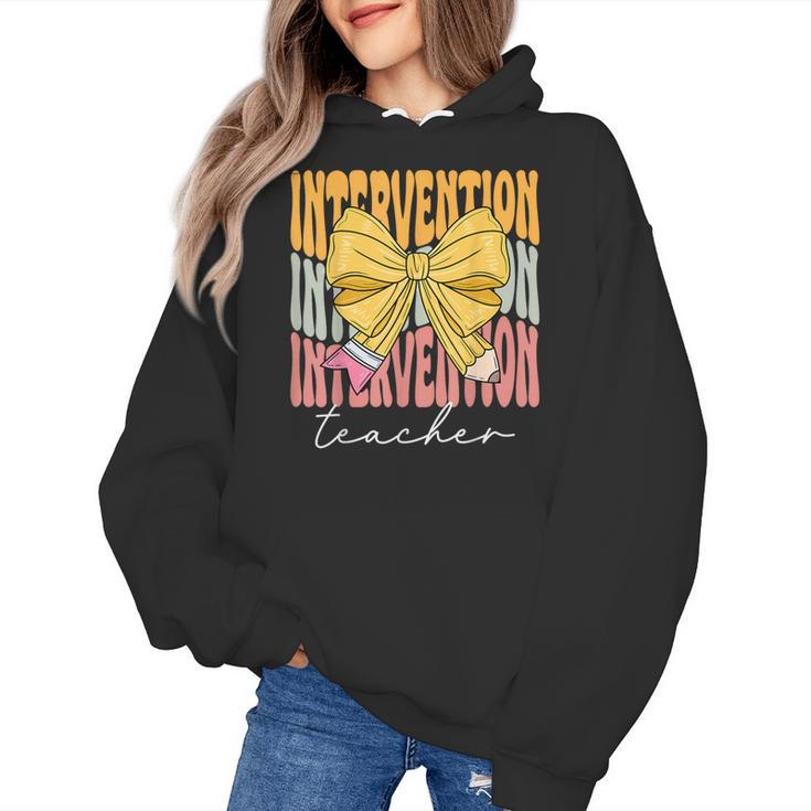 Interventionist Teacher Groovy Coquette Bow Back To School Women's Hoodie