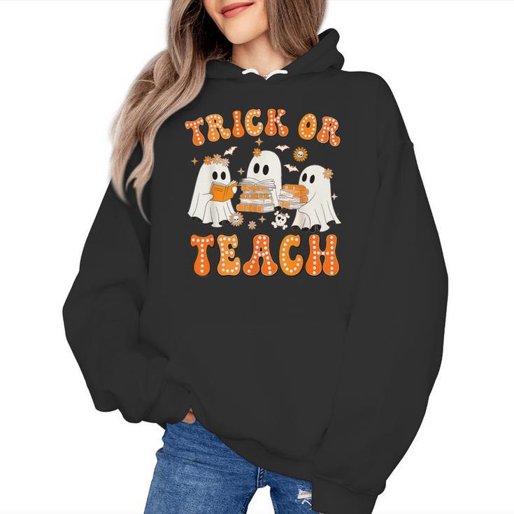Teacher Halloween Trick Or Teach Retro Groovy Floral Ghost Women's Hoodie