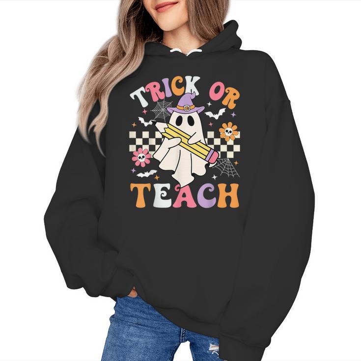 Trick Or Teach Groovy Teacher Halloween Retro Teacher Ghost Women's Hoodie