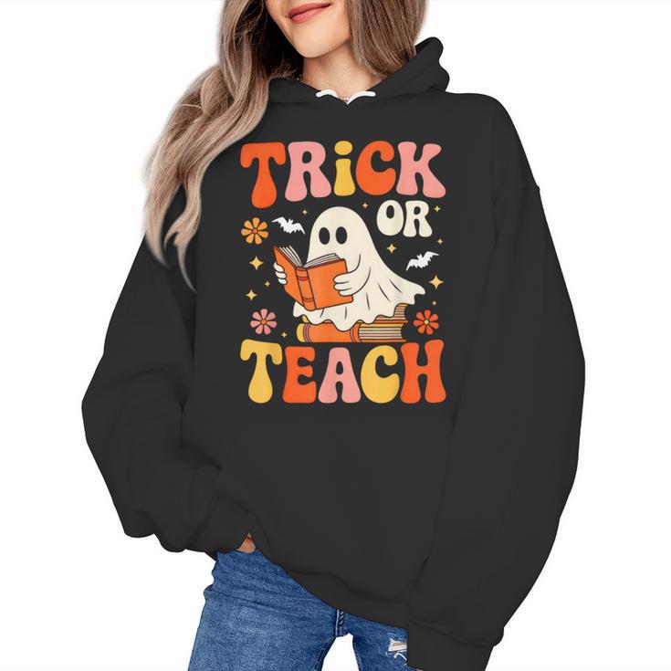 Trick Or Teach Halloween Shirt For Teacher Kids Floral Ghost Women's Hoodie, trending gift Trick Or Teach Halloween Shirt For Teacher Kids Floral Ghost Women's Hoodie, trending gift