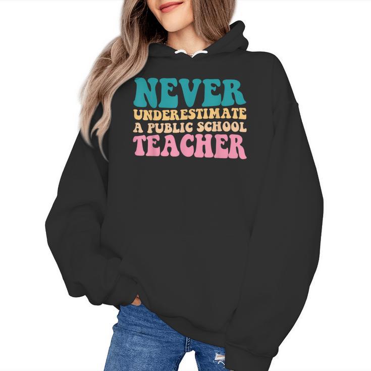 Never Underestimate A Public School Teacher Groovy Women Women's Hoodie