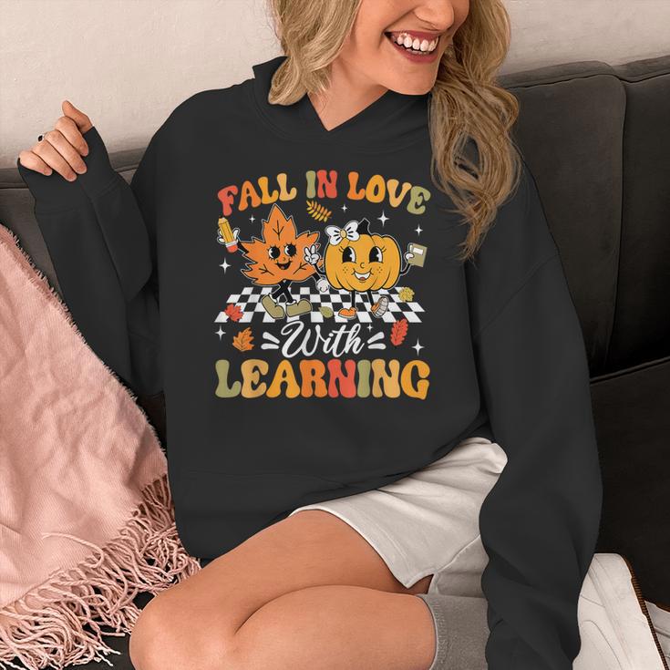 Fall In Love With Learning Fall Teacher Thanksgiving Retro Women's Hoodie, funny design