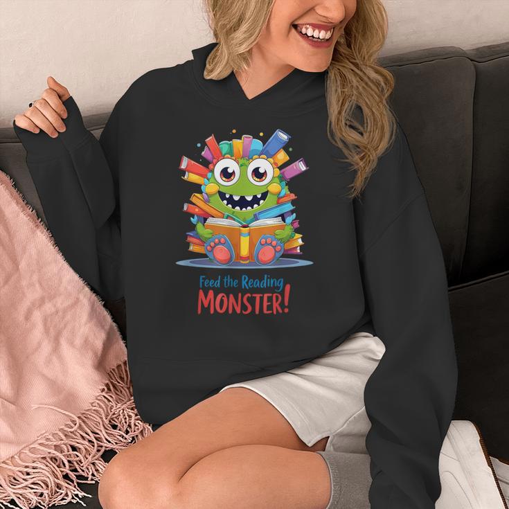 Feed The Reading Monster Halloween Teacher Women's Hoodie, funny design