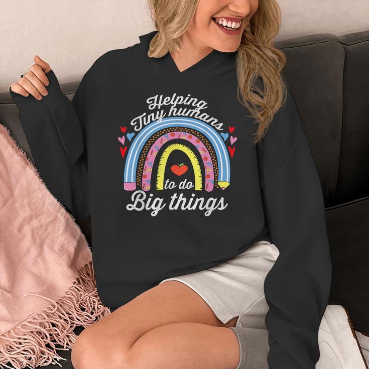 Helping Tiny Humans To Do Big Things Teacher Women Women's Hoodie, funny design