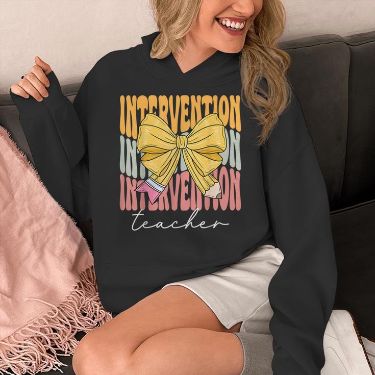 Interventionist Teacher Groovy Coquette Bow Back To School Women's Hoodie, Groovy Teacher Gifts, funny design Interventionist Teacher Groovy Coquette Bow Back To School Women's Hoodie, Groovy Teacher Gifts, funny design