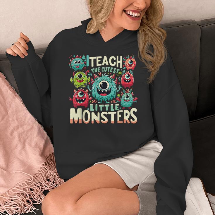 I Teach The Cutest Little Monsters Teacher Halloween Outfit Women's Hoodie, funny design