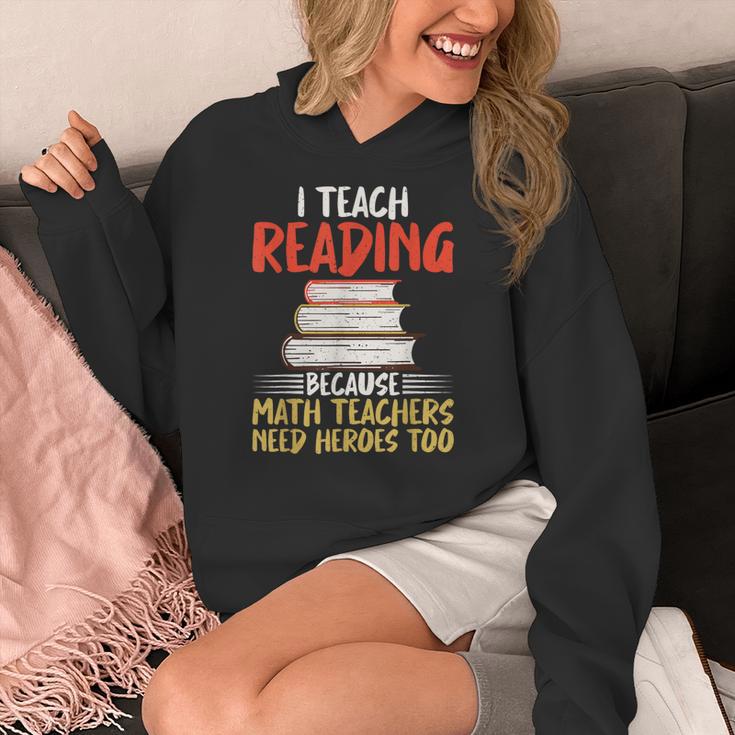 I Teach Reading Because Math Teachers Need Heroes Too Men Women Women's Hoodie, funny design