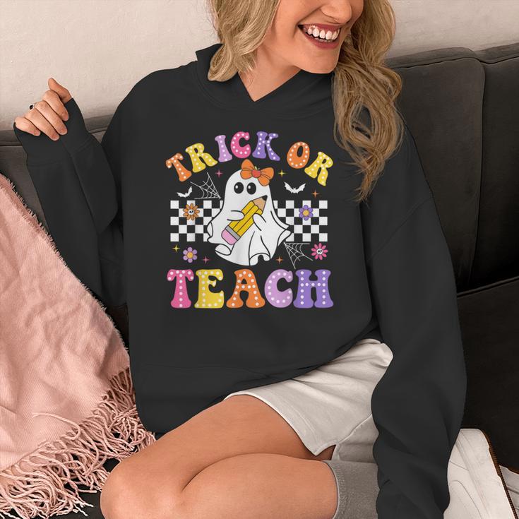 Trick Or Teach Groovy Halloween Teachers Women's Hoodie, funny design Trick Or Teach Groovy Halloween Teachers Women's Hoodie, funny design
