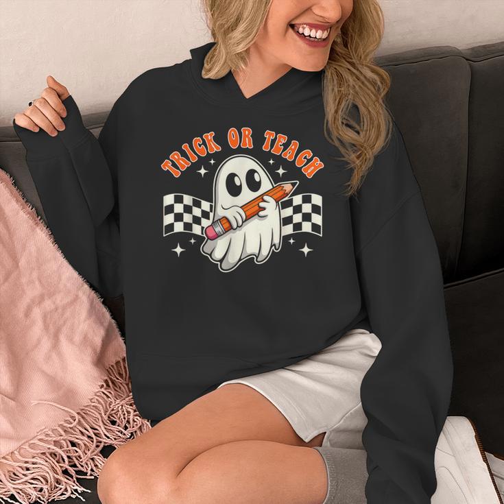 Trick Or Teach Groovy Retro Ghost Halloween Teacher Kids Women's Hoodie, Groovy Teacher Gifts, funny design