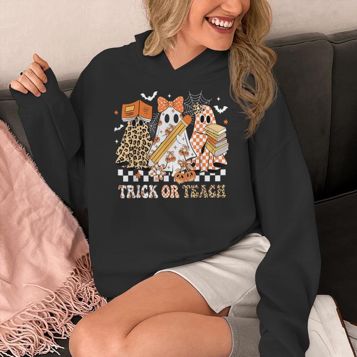 Trick Or Teach Groovy Teacher Halloween Floral Ghost Women's Hoodie, Groovy Teacher Gifts, funny design Trick Or Teach Groovy Teacher Halloween Floral Ghost Women's Hoodie, Groovy Teacher Gifts, funny design