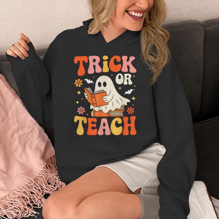 Trick Or Teach Halloween Shirt For Teacher Kids Floral Ghost Women's Hoodie, funny design Trick Or Teach Halloween Shirt For Teacher Kids Floral Ghost Women's Hoodie, funny design