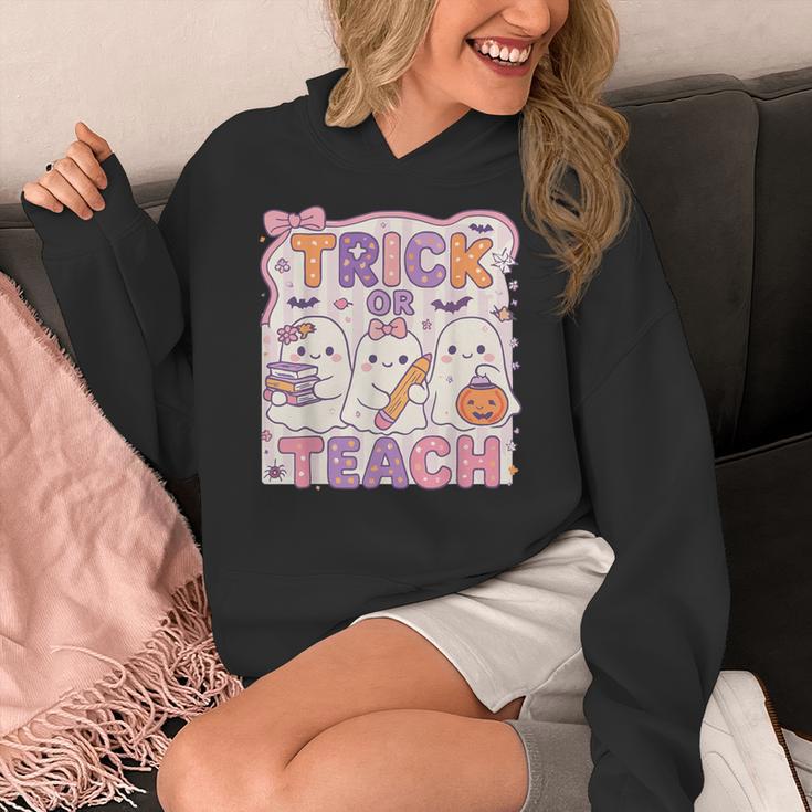 Trick Or Teach Retro Halloween Teacher Look Women's Hoodie, funny design