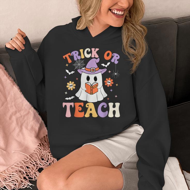 Trick Or Teach Teacher Groovy Ghost Halloween Teacher Women's Hoodie, Groovy Teacher Gifts, funny design Trick Or Teach Teacher Groovy Ghost Halloween Teacher Women's Hoodie, Groovy Teacher Gifts, funny design