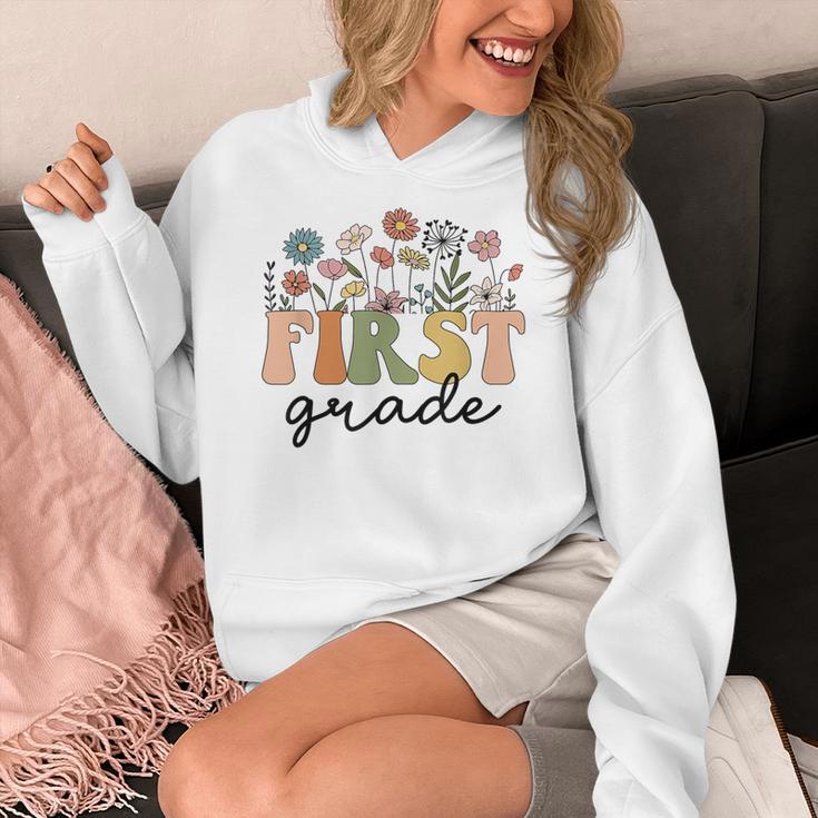 First Grade Teacher Wildflower Back To School Floral Outfits Women's Hoodie, First Grade Teacher Gifts, funny design