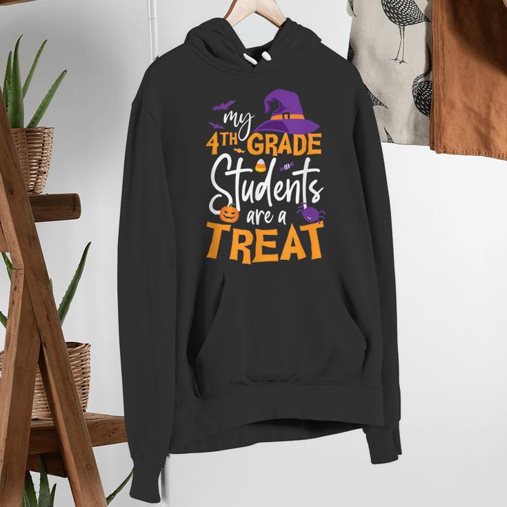 My 4th Grade Students Are a Treat Teacher Halloween Witch For Men Women Kids Women's Hoodie, 4th Grade Teacher Hoodies, funny gift