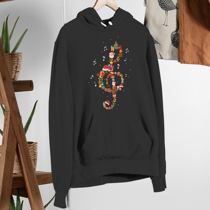 Christmas Musical Note Music Lover Teacher Sing Carols Jesus Women's Hoodie, funny gift