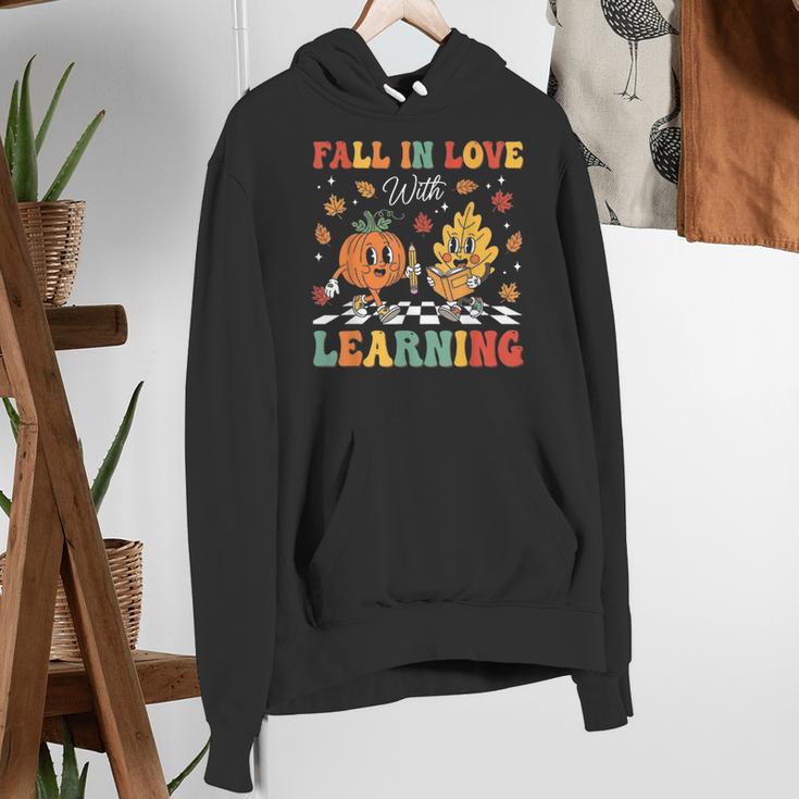Groovy Fall In Love With Learning Autumn Pumpkin Teacher Women's Hoodie, Groovy Teacher Hoodies, funny gift Groovy Fall In Love With Learning Autumn Pumpkin Teacher Women's Hoodie, Groovy Teacher Hoodies, funny gift
