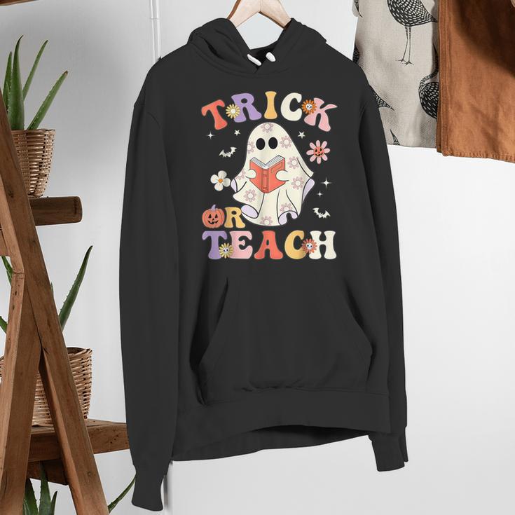 Groovy Halloween Trick Or Teach Retro Floral Ghost Teacher Women's Hoodie, Groovy Teacher Hoodies, funny gift Groovy Halloween Trick Or Teach Retro Floral Ghost Teacher Women's Hoodie, Groovy Teacher Hoodies, funny gift