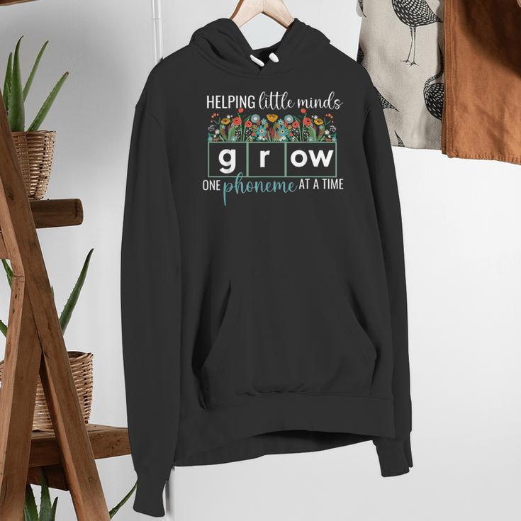 Helping Little Minds Grow One Phoneme At A Time Teacher Women's Hoodie, funny gift