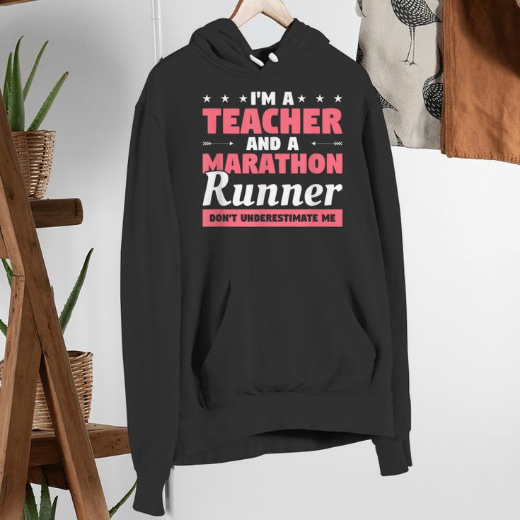 I'm A Teacher And A Marathon Runner Don't Underestimate Me Men Women Women's Hoodie, funny gift