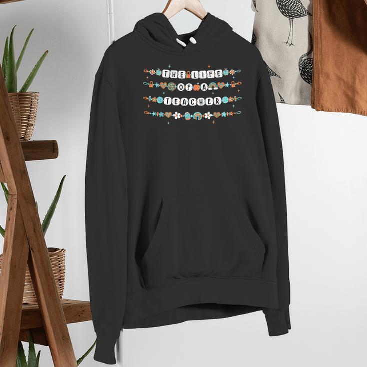 The Life Of A Teacher Friendship Bracelets Elementary School Women's Hoodie, funny gift