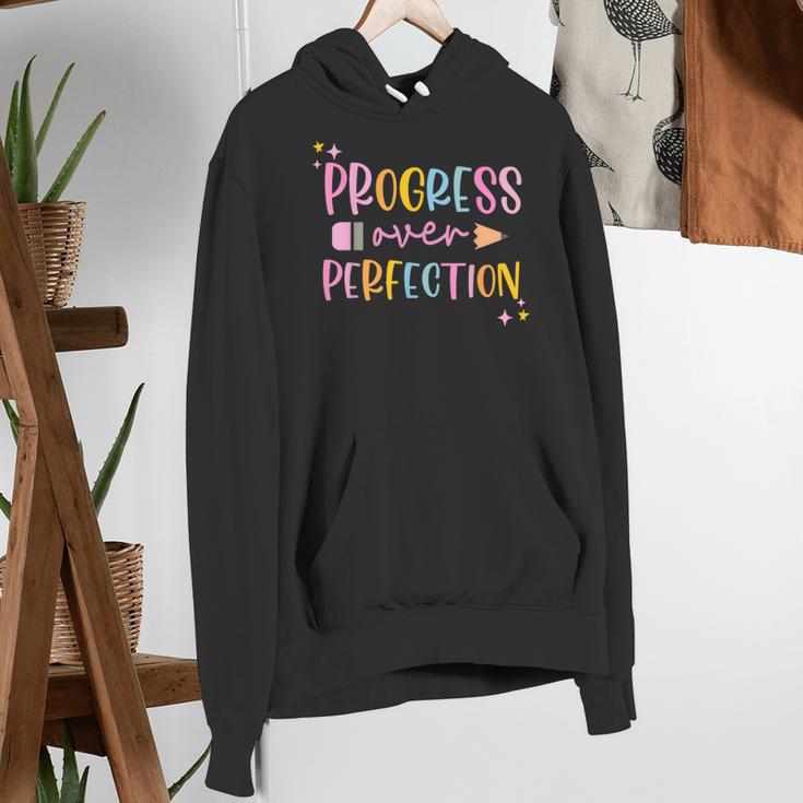 Motivational Progress Over Perfection Back To School Teacher Women's Hoodie, funny gift Motivational Progress Over Perfection Back To School Teacher Women's Hoodie, funny gift