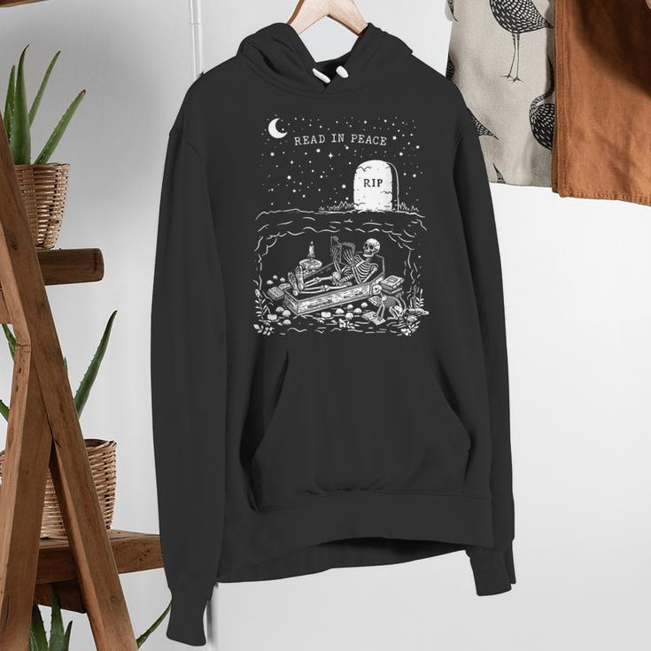 Read In Peace Skeleton Halloween Book Reading Spooky Teacher Women's Hoodie, funny gift