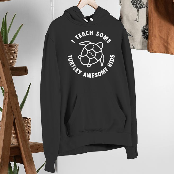 I Teach Some Turtley Awesome Kids Teacher Turtle Pun Women's Hoodie, funny gift