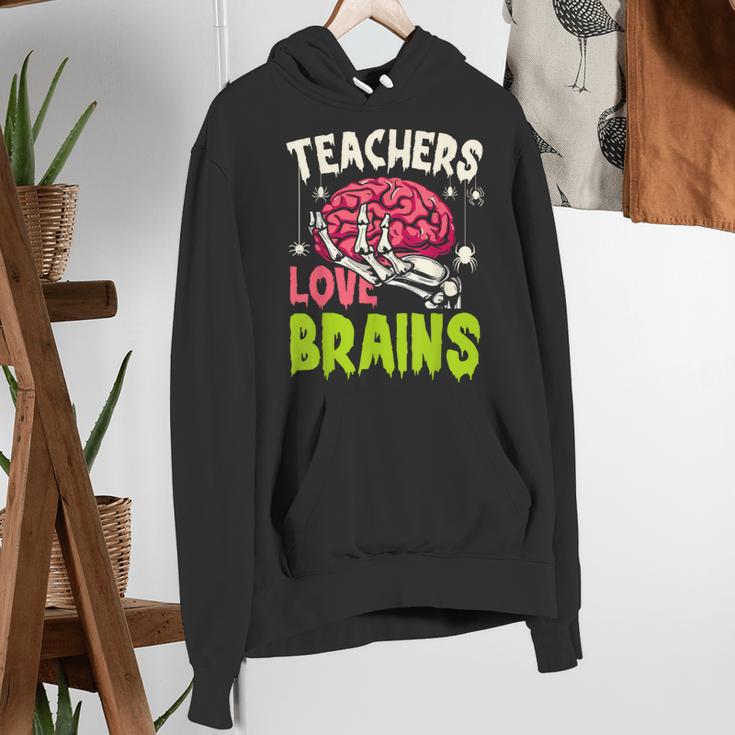 Teachers Love Brains Skeleton Halloween Teacher Funny Women's Hoodie, funny gift
