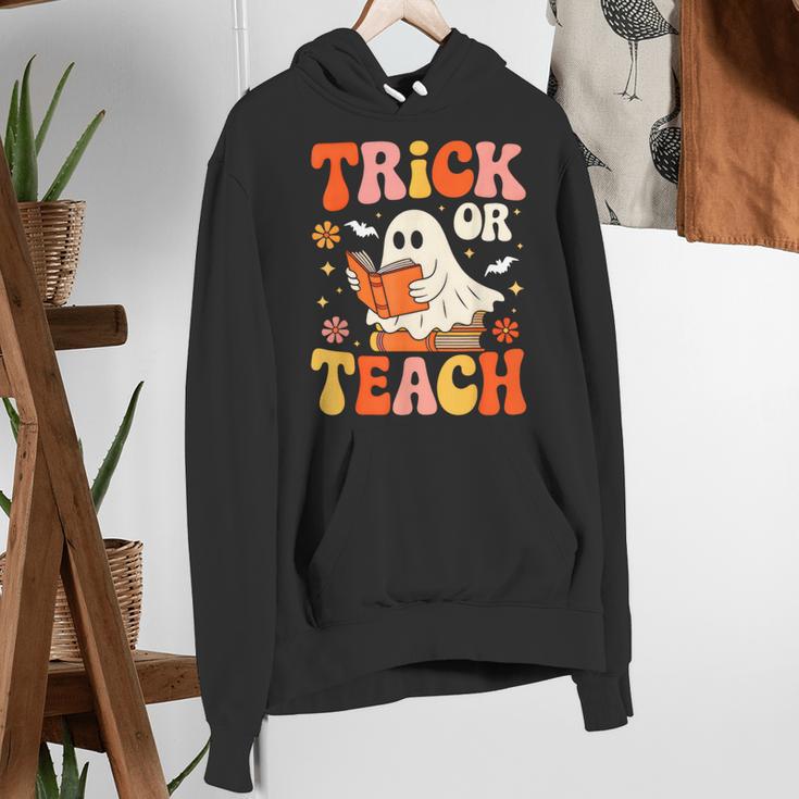 Trick Or Teach Halloween Shirt For Teacher Kids Floral Ghost Women's Hoodie, funny gift Trick Or Teach Halloween Shirt For Teacher Kids Floral Ghost Women's Hoodie, funny gift