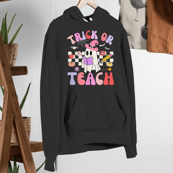 Trick Or Teach Halloween Teacher Floral Ghost Groovy Women's Hoodie, Groovy Teacher Hoodies, funny gift