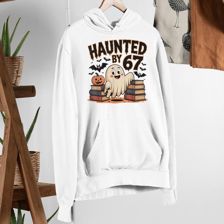 Haunted By 67 Teacher Ghost Pumpkin Halloween Costum Women's Hoodie, funny gift